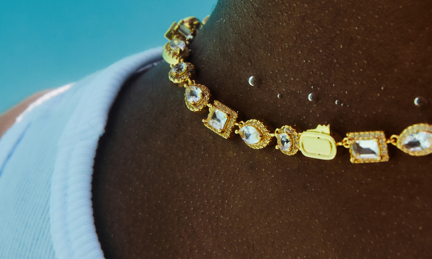 Men's ICED Gold Necklace sparkling and reflecting the light underwater
