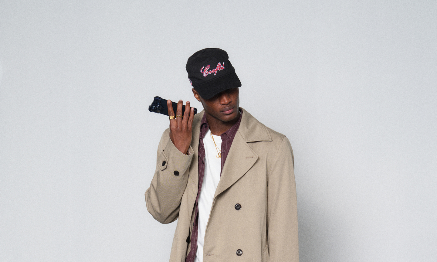 Man styling a baseball hat for spring